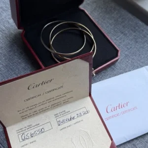 Bracelet jonc Cartier Trinity Tricolore en or 18 carats, modèle classique