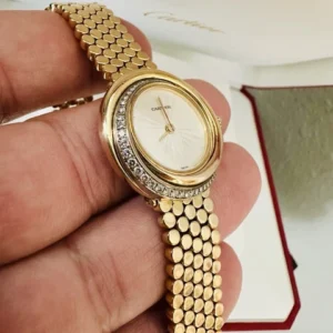 Montre Cartier Trinity pour femme, or jaune 18 carats et diamants ~ Boîte et papiers