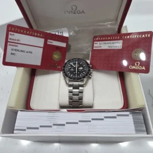 Chronographe automatique Omega Speedmaster HB-SIA GMT d'occasion. Bon état.